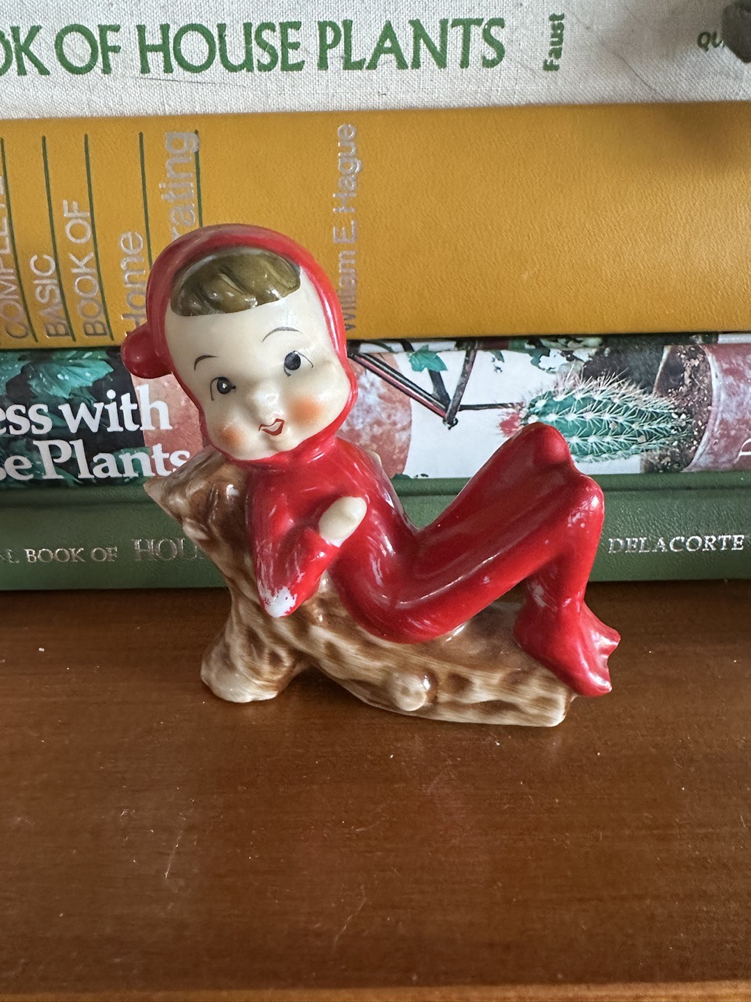 Vintage Pixie Resting On A Log